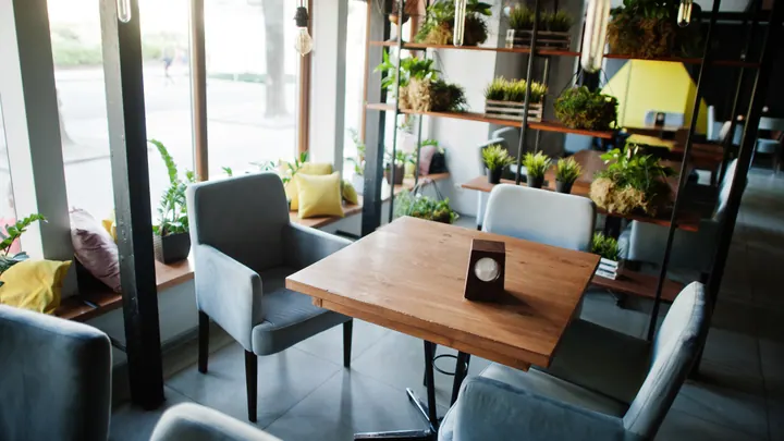 Chairs and a table in a modern cafe interior