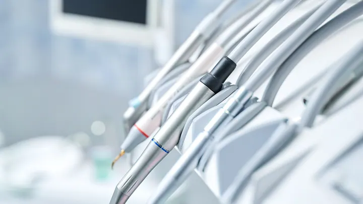 Dental instruments laid out at a dentist's chair